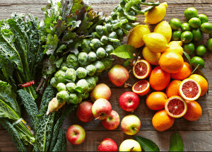 a group of fruits and vegetables on a wood surface Healthy Weight Loss Diets Solihull Lodge